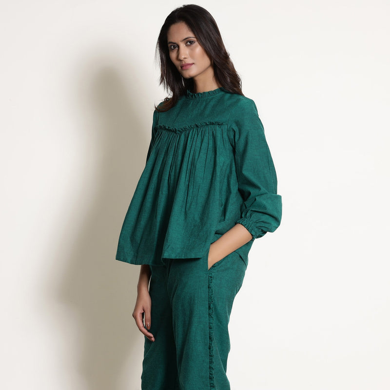 Left View of a Model wearing Green Warm Cotton Frilled Gathered Yoke Top
