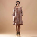 Front View of a Model wearing Warm Kalamkari Block Print Knee Length Cotton Dress
