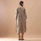 Back View of a Model wearing Kalamkari Block Printed Cotton Midi Dress