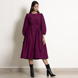 Front View of a Model wearing Warm Mulberry 100% Cotton Frilled Yoke Dress