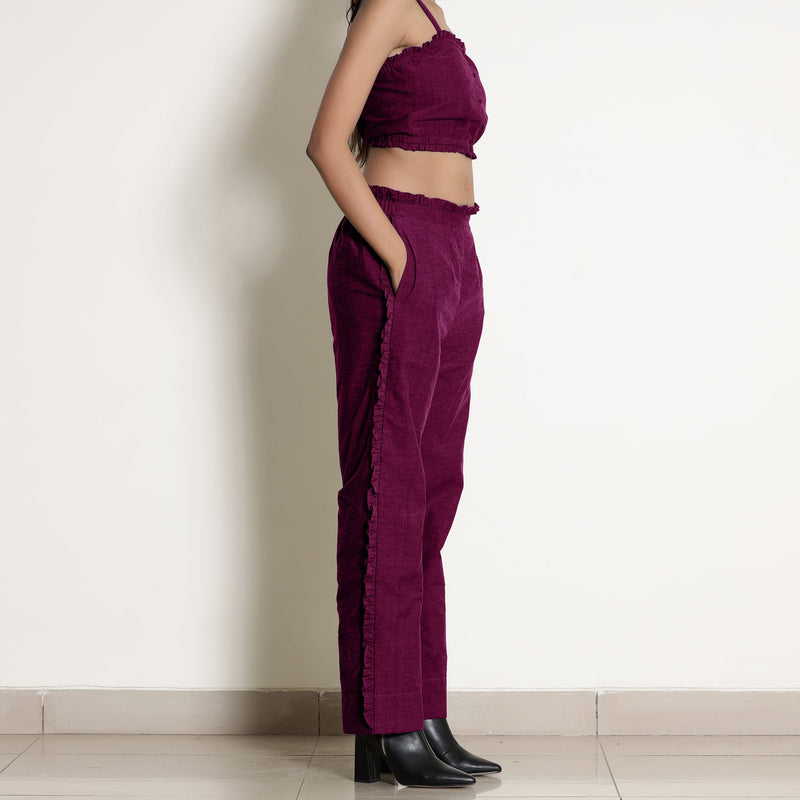 Right View of a Model wearing Warm Mulberry Frilled Straight Pant