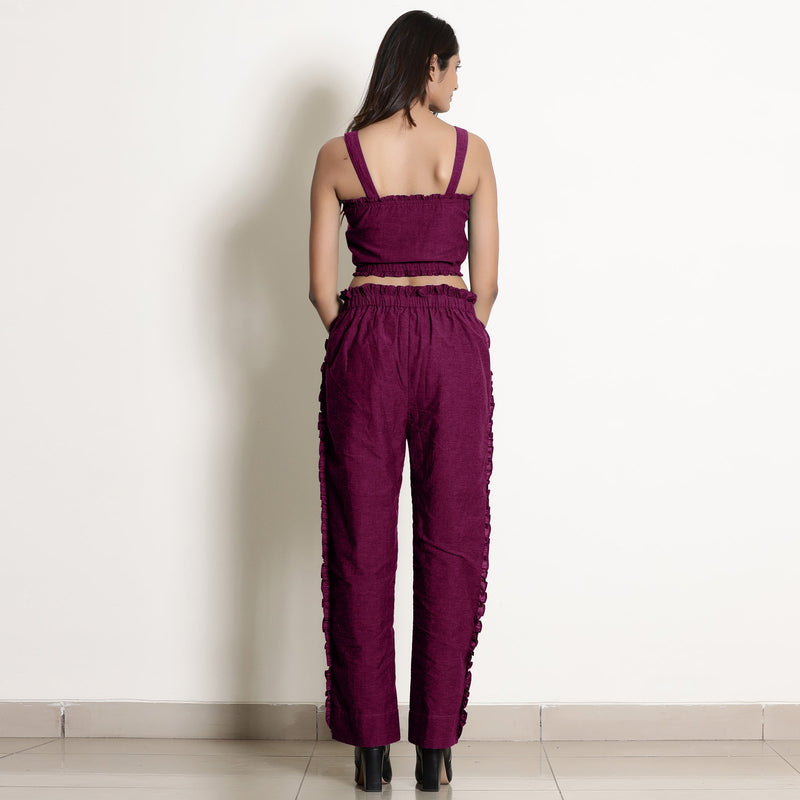 Back View of a Model wearing Warm Mulberry Frilled Straight Pant