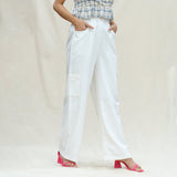 Right View of a Model wearing White 100% Cotton Elasticated High-Rise Cargo Pant