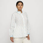Right View of a Model wearing White Block Printed Cotton Straight Top
