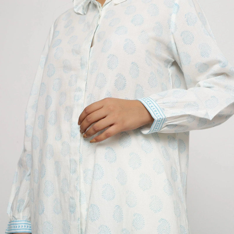 Left Detail of a Model wearing White Block Printed Cotton Straight Top