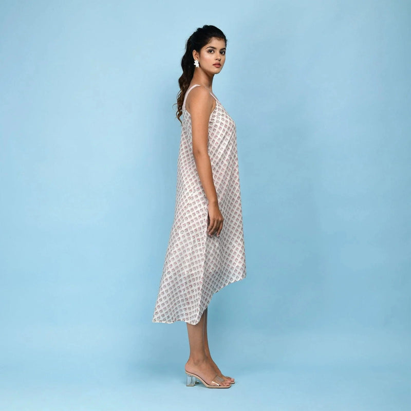 Right View of a Model wearing White Block Printed High-Low Cotton Midi Dress