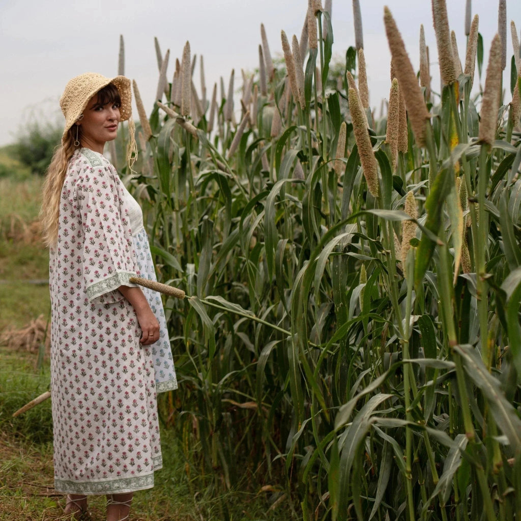 Right View of a Model wearing White Block Printed Straight Shrug