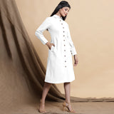 Right View of a Model wearing White Button Down Cotton Flax Knee Length Formal Dress