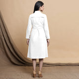 Back View of a Model wearing White Button Down Cotton Flax Knee Length Formal Dress