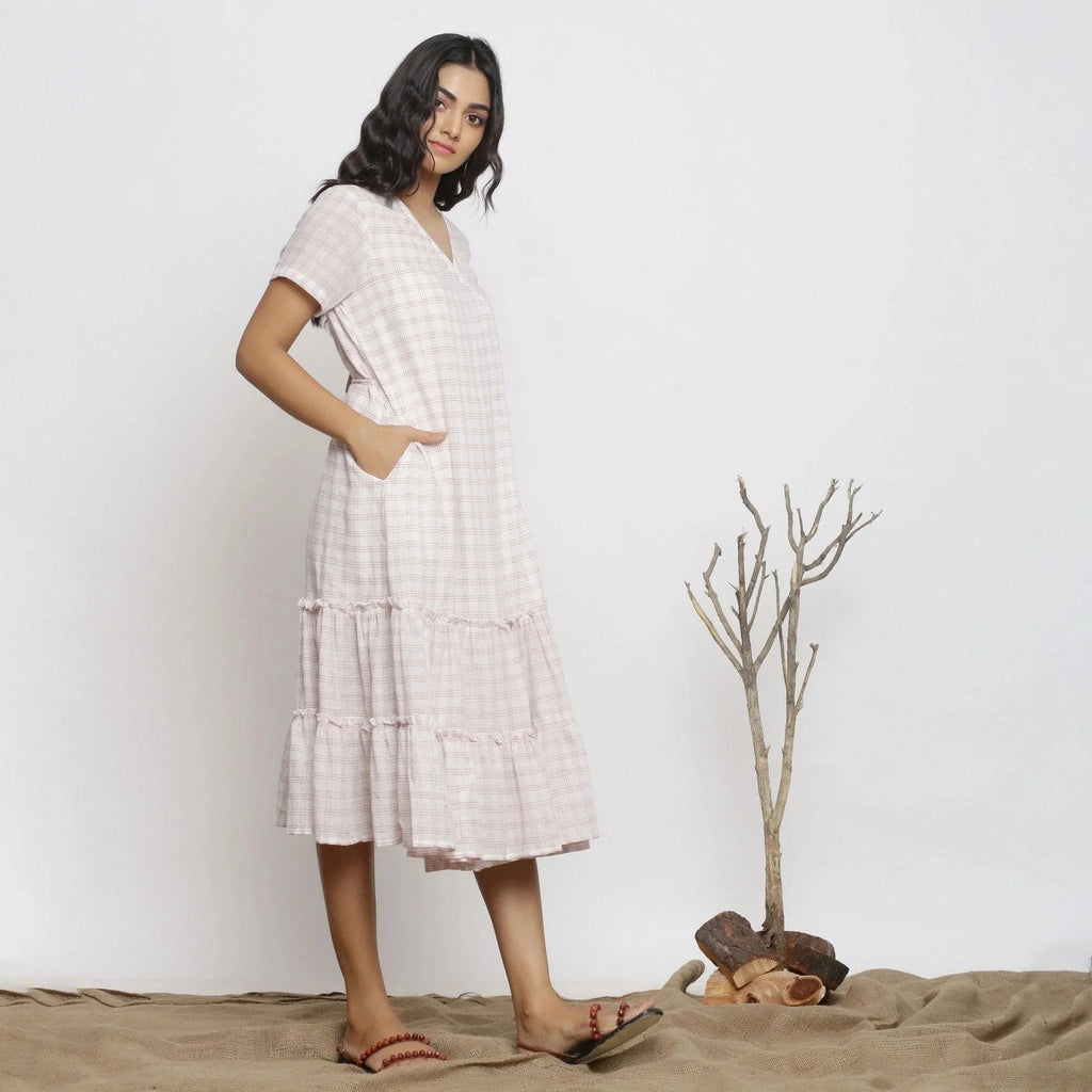 Right View of a Model wearing White Checks Handspun Cotton Muslin Midi Wrap Dress