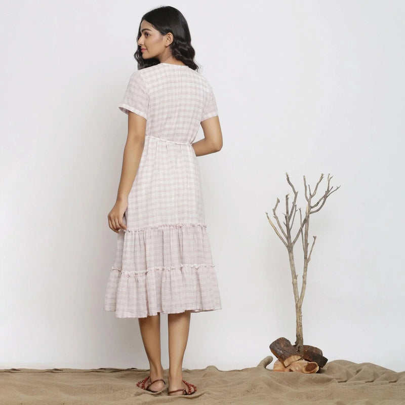 Back View of a Model wearing White Checks Handspun Cotton Muslin Midi Wrap Dress