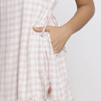 Front Detail of a Model wearing White Checks Handspun Cotton Muslin Midi Wrap Dress