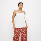 Front View of a Model wearing White Cotton Flax Spaghetti Strap Top