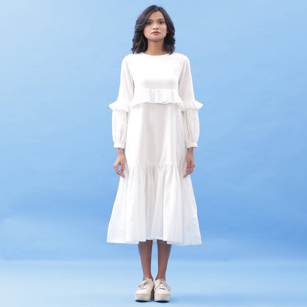 Front View of a Model wearing White Cotton Frilled Bohemian Tier Midi Dress