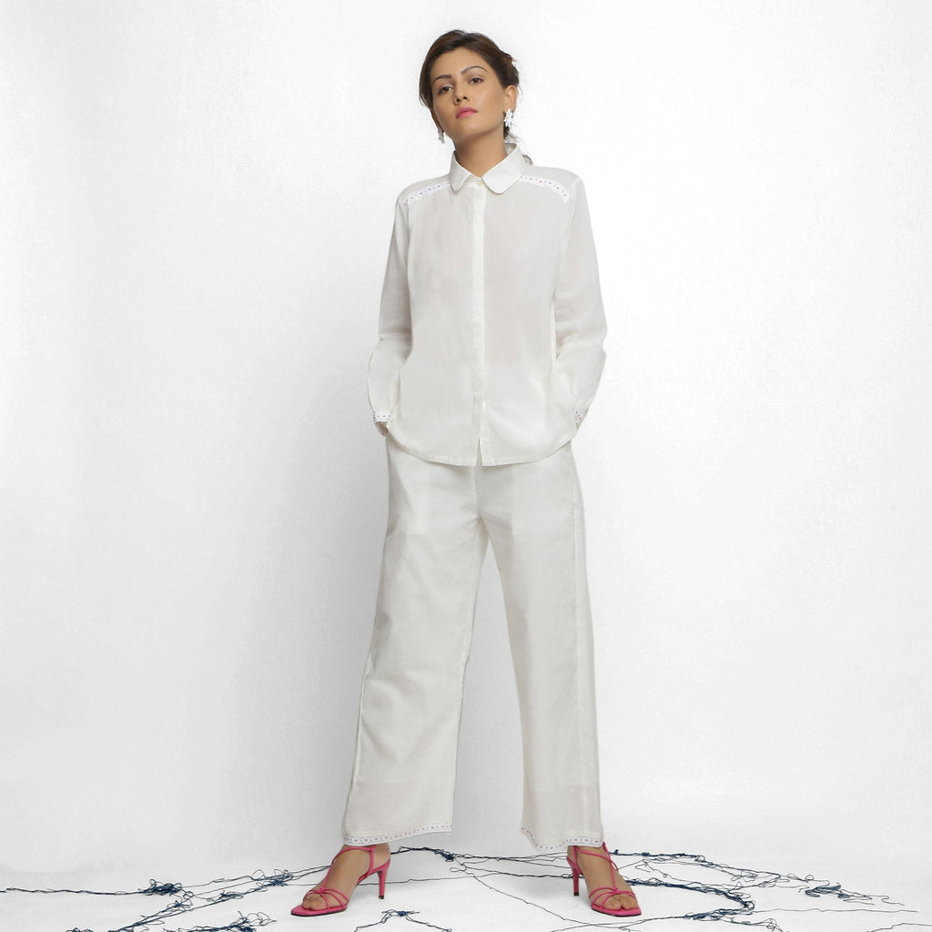 Front View of a Model wearing White Organic Cotton Lined Peter Pan Gathered Top