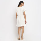 Back View of a Model wearing White Cotton Solid Wrap Dress
