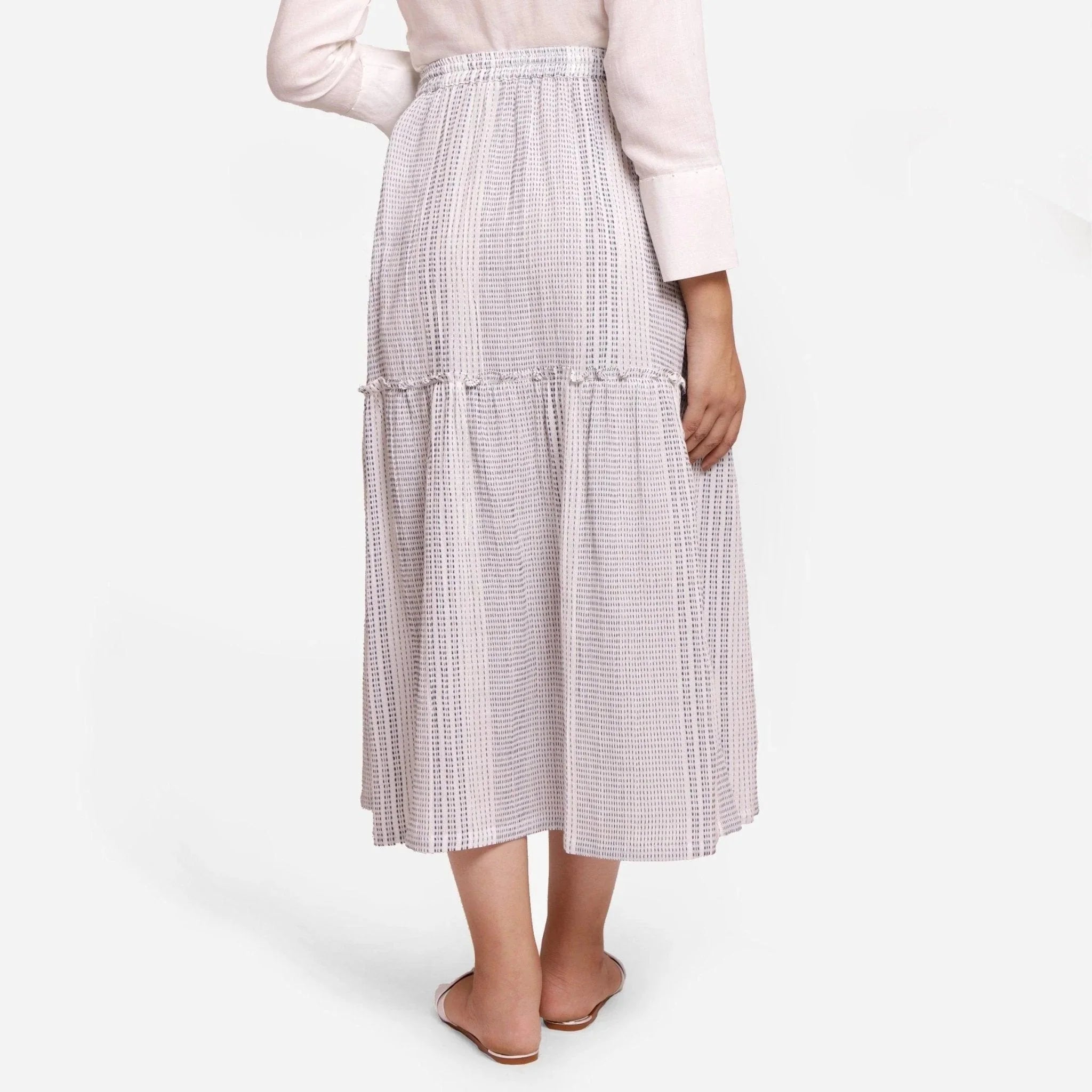 Back View of a Model wearing White Crinkled Cotton Elasticated Gathered Maxi Skirt