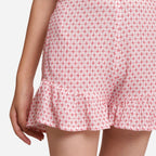 Front Detail of a Model wearing White Crinkled Cotton Frilled Elasticated Short Shorts