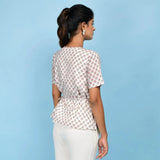 Back View of a Model wearing White Floral Block Printed Cotton A-Line Top