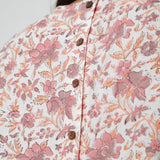 Front Detail of a Model wearing White Floral Printed Sleeveless Top