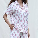 Front Detail of a Model wearing White and Fuchsia Block Printed Cotton Half Sleeve Shirt