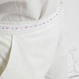 Front Detail of a Model wearing Solid White Hand Beaded Straight Pant