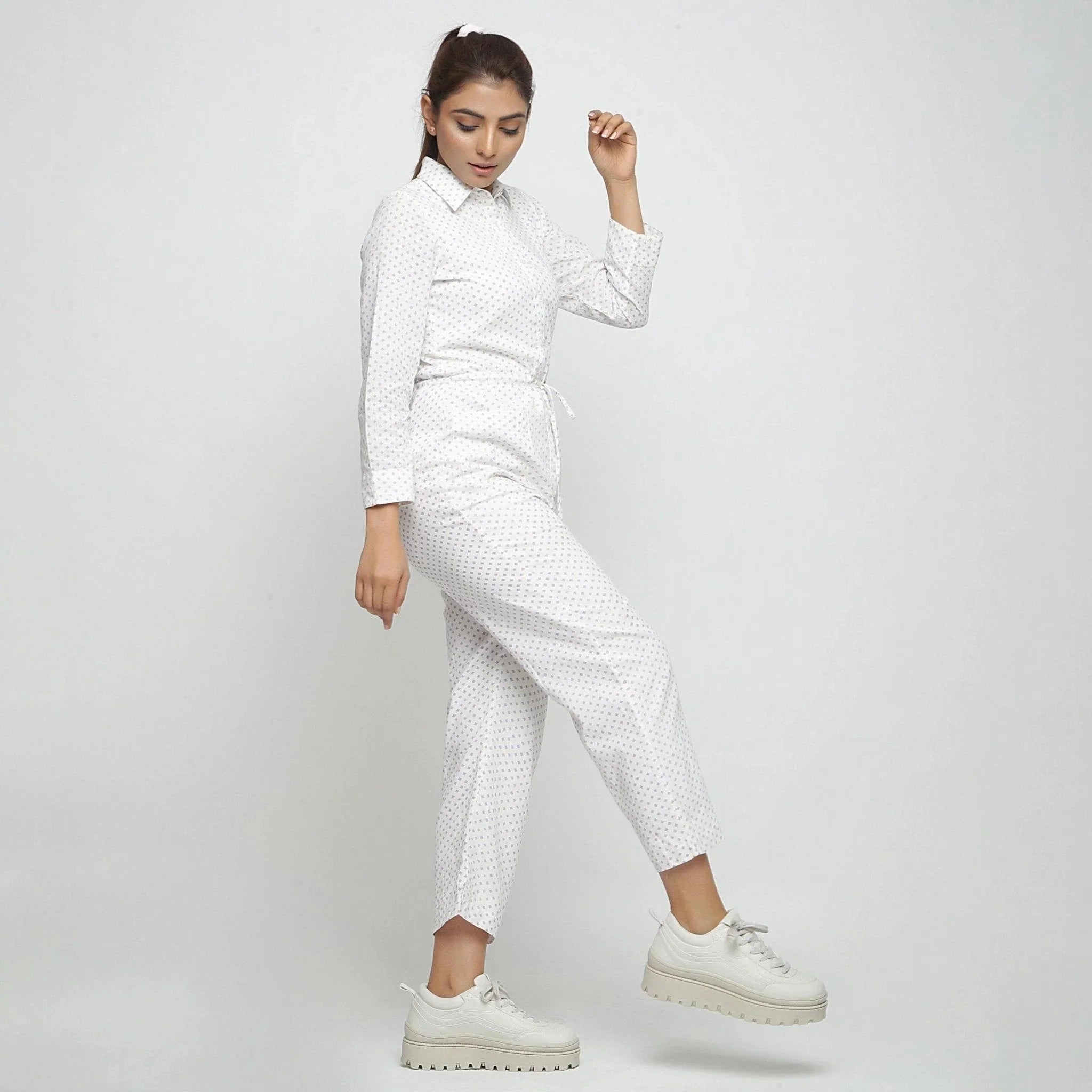 Right View of a Model wearing White And Purple Hand Block Print Overall