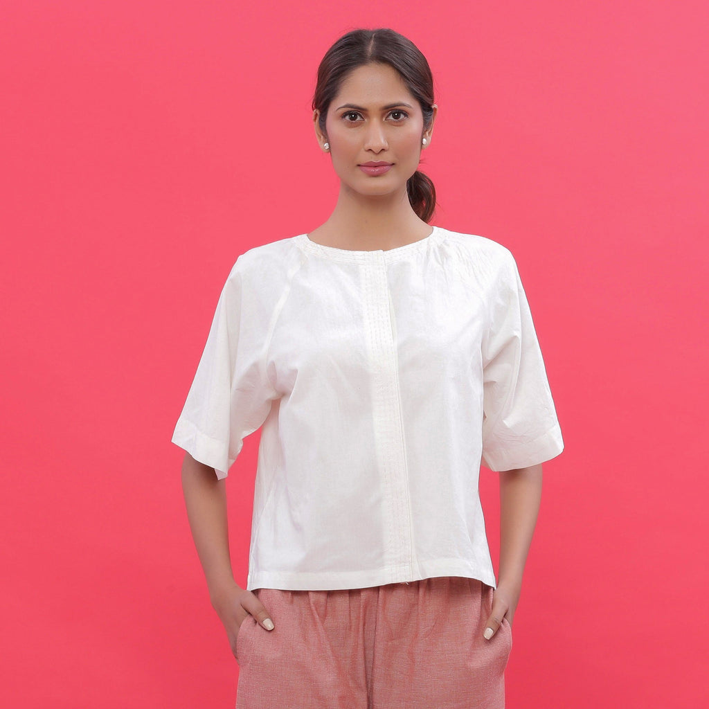 Front View of a Model wearing White Hand Embroidered Straight Top