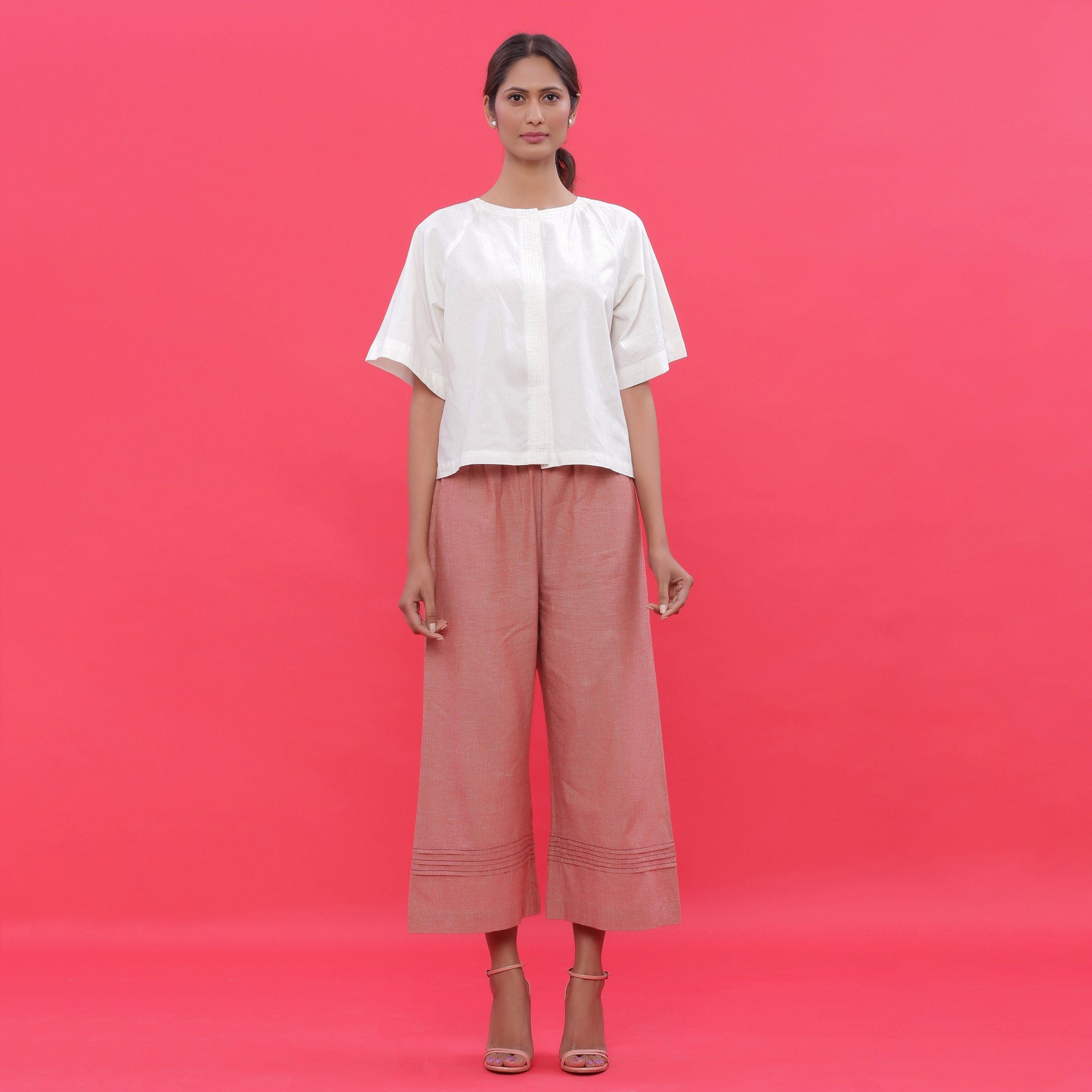 Front View of a Model wearing White Hand Embroidered Straight Top