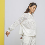 Right View of a Model wearing White Floral Hand-Embroidered Cotton Lace Yoked Shirt