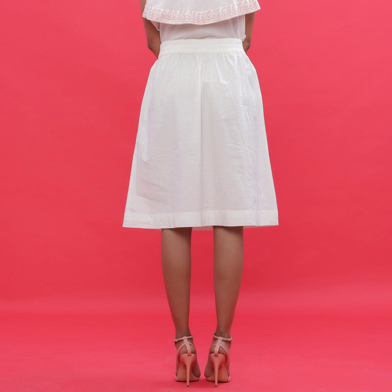 Back View of a Model wearing White Poplin A-Line Hand Beaded Skirt