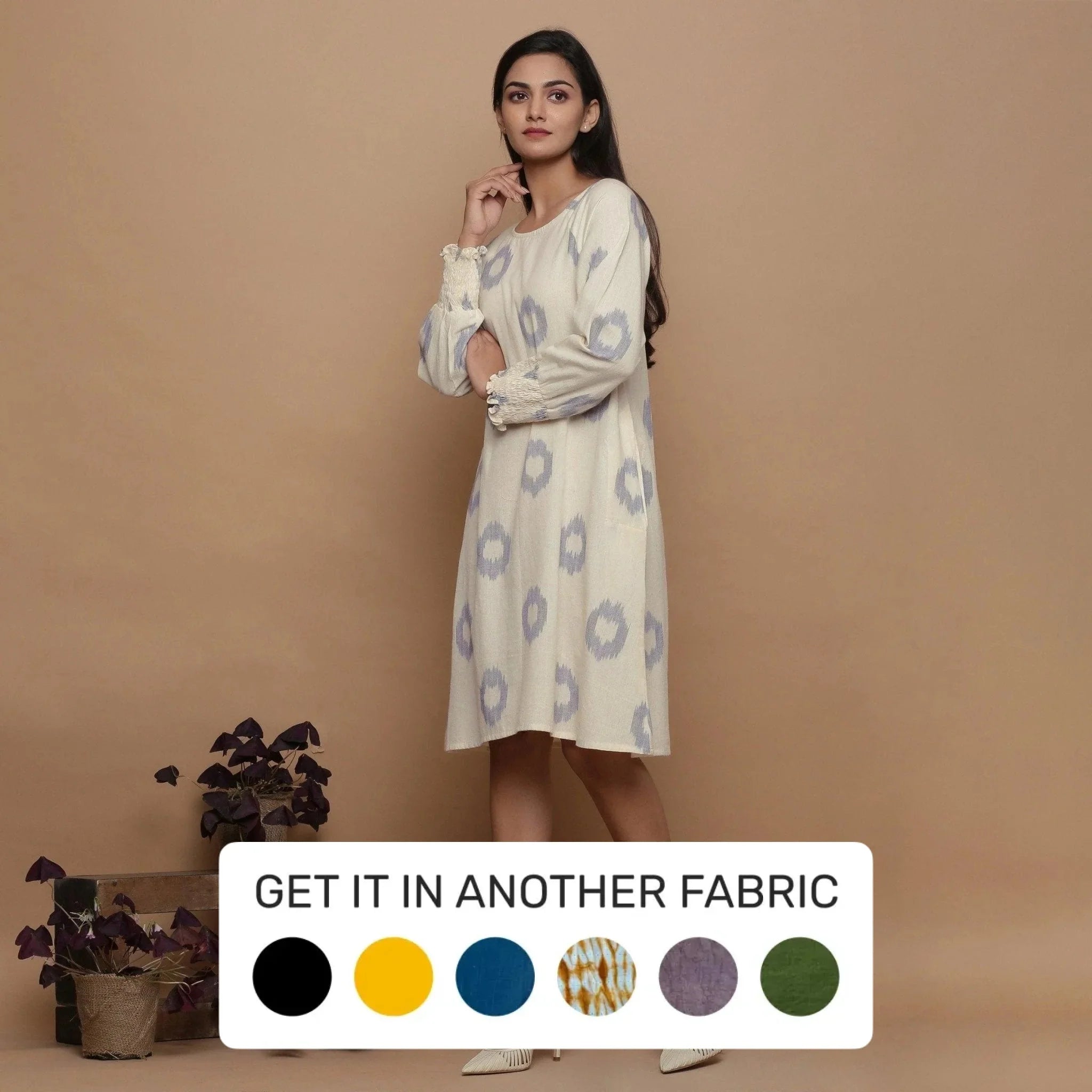 Left View of a Model wearing Raglan Sleeves Cotton White Shift Dress