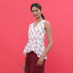 Left View of a Model wearing White Sanganeri Block Print High-Low Cotton Top