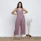 Front View of a Model wearing Wine Handspun Deep Neck Wrap Jumpsuit