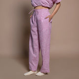 Left View of a Model wearing Wine 100% Cotton Block Printed High-Rise Pant