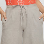Front Detail of a Model wearing Beige Yarn Dyed 100% Cotton Elasticated Paneled Pegged Pant
