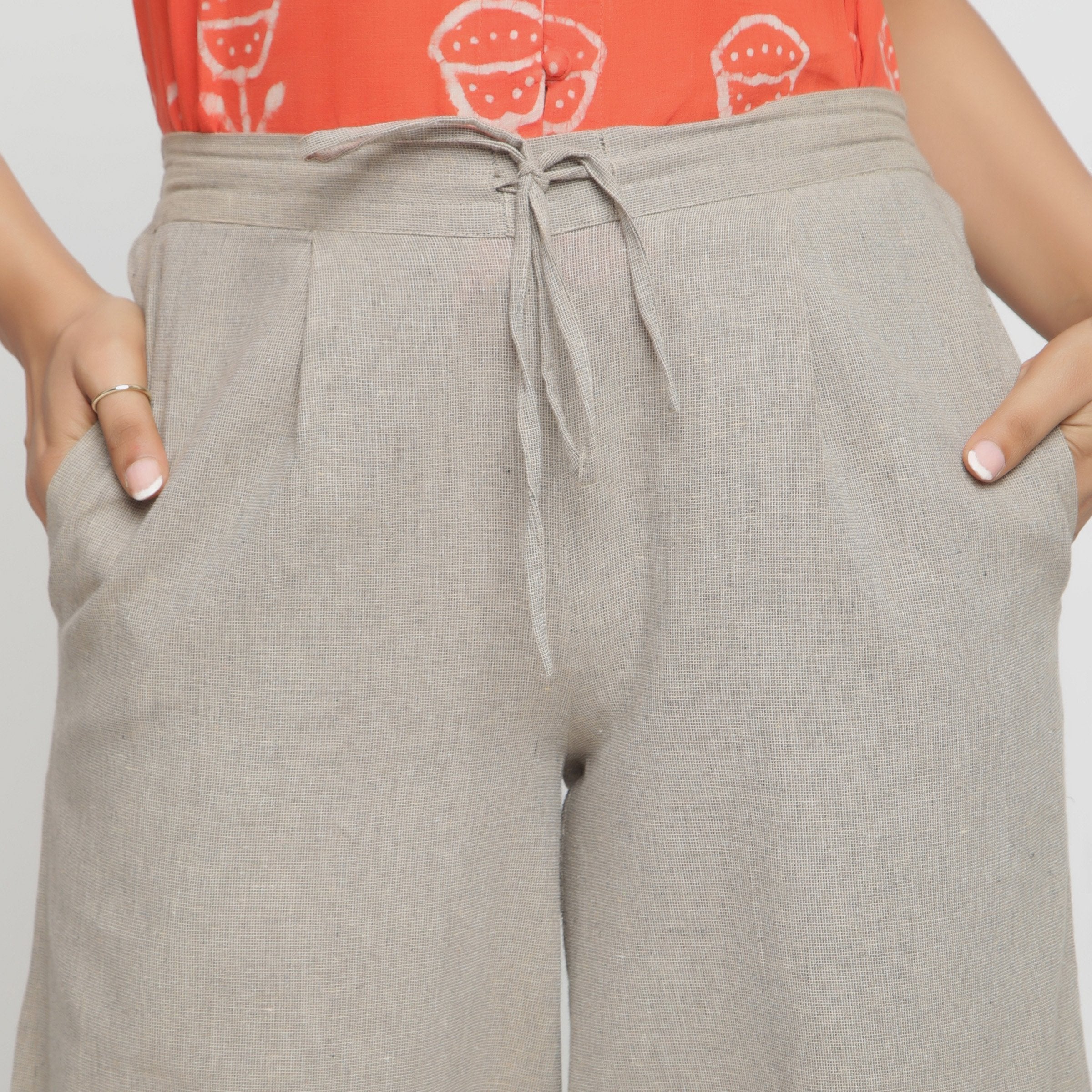 Front Detail of a Model wearing Beige Yarn Dyed 100% Cotton Elasticated Paneled Pegged Pant