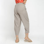 Back View of a Model wearing Beige Yarn Dyed 100% Cotton Elasticated Paneled Pegged Pant