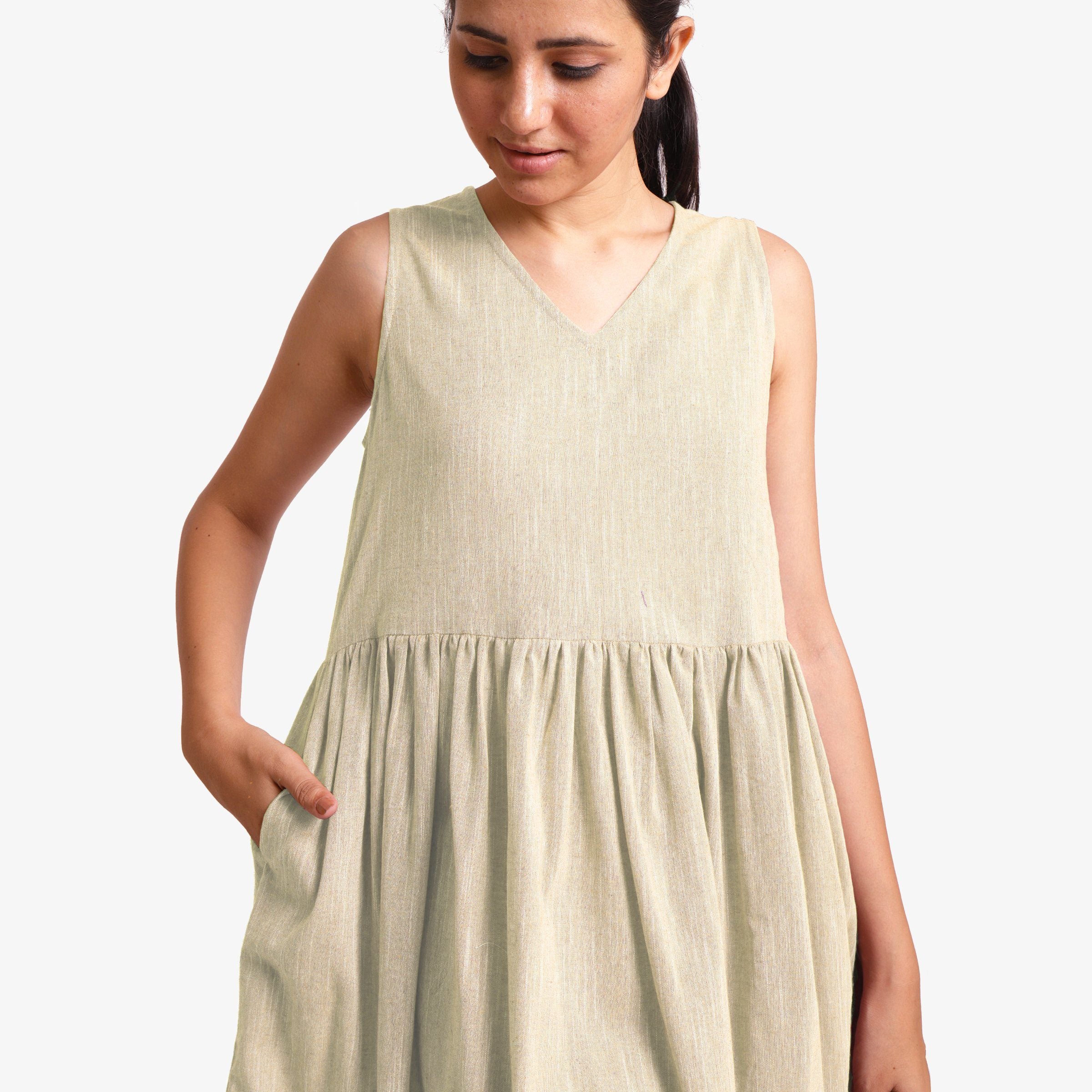 Front Detail of a Model wearing Yarn Dyed Cotton Beige Yoke Dress