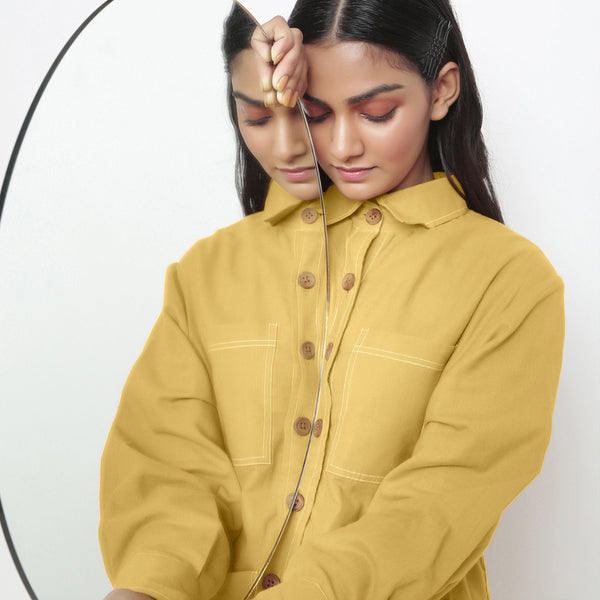 Front Detail of a Model wearing Yellow 100% Cotton Button-Down Outerwear