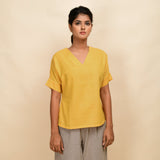 Front View of a Model wearing Yellow Handspun 100% Cotton Drop Shoulder Straight Top