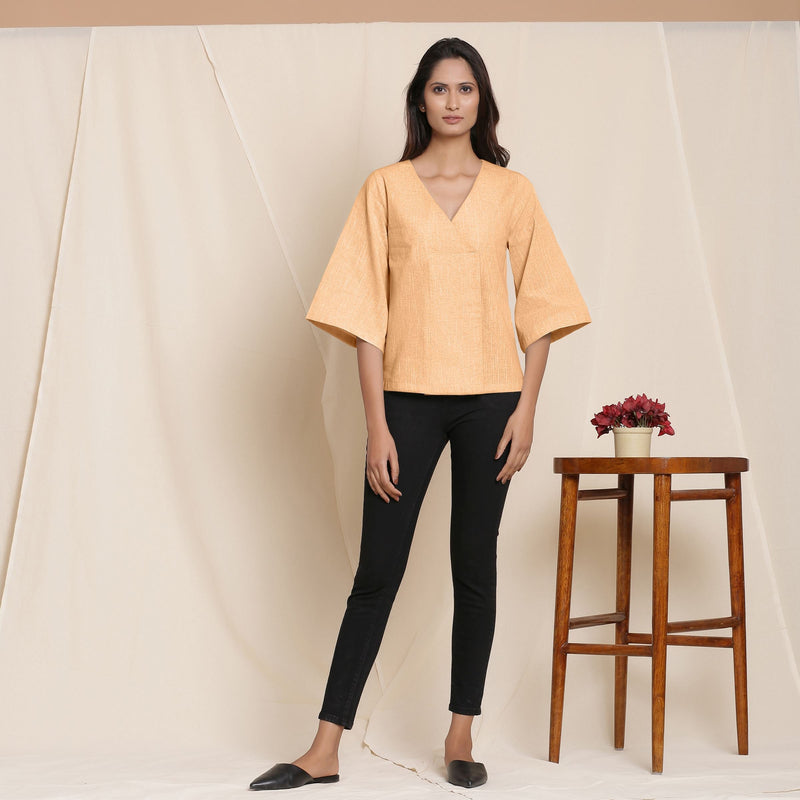 Front View of a Model wearing Yellow Comfy Straight Top