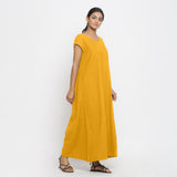 Right View of a Model wearing Yellow Cotton Flax A-Line Paneled Dress