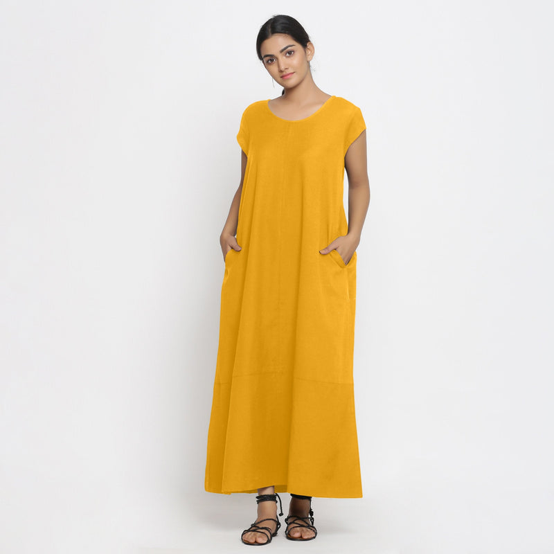 Front View of a Model wearing Yellow Cotton Flax A-Line Paneled Dress
