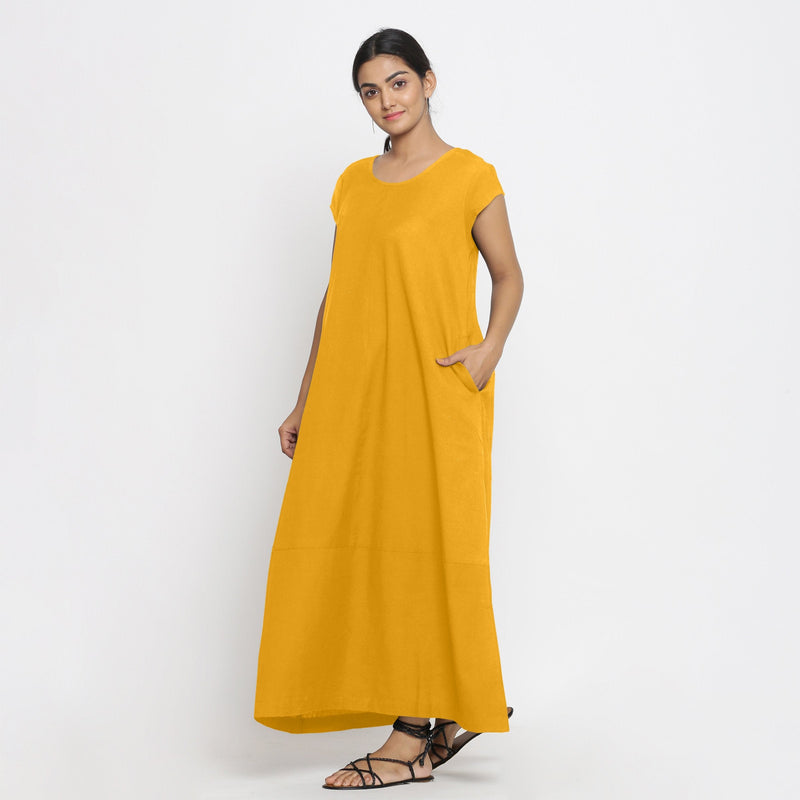 Left View of a Model wearing Yellow Cotton Flax A-Line Paneled Dress