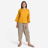 Front View of a Model wearing Yellow Cotton Flax Flared A-Line Top