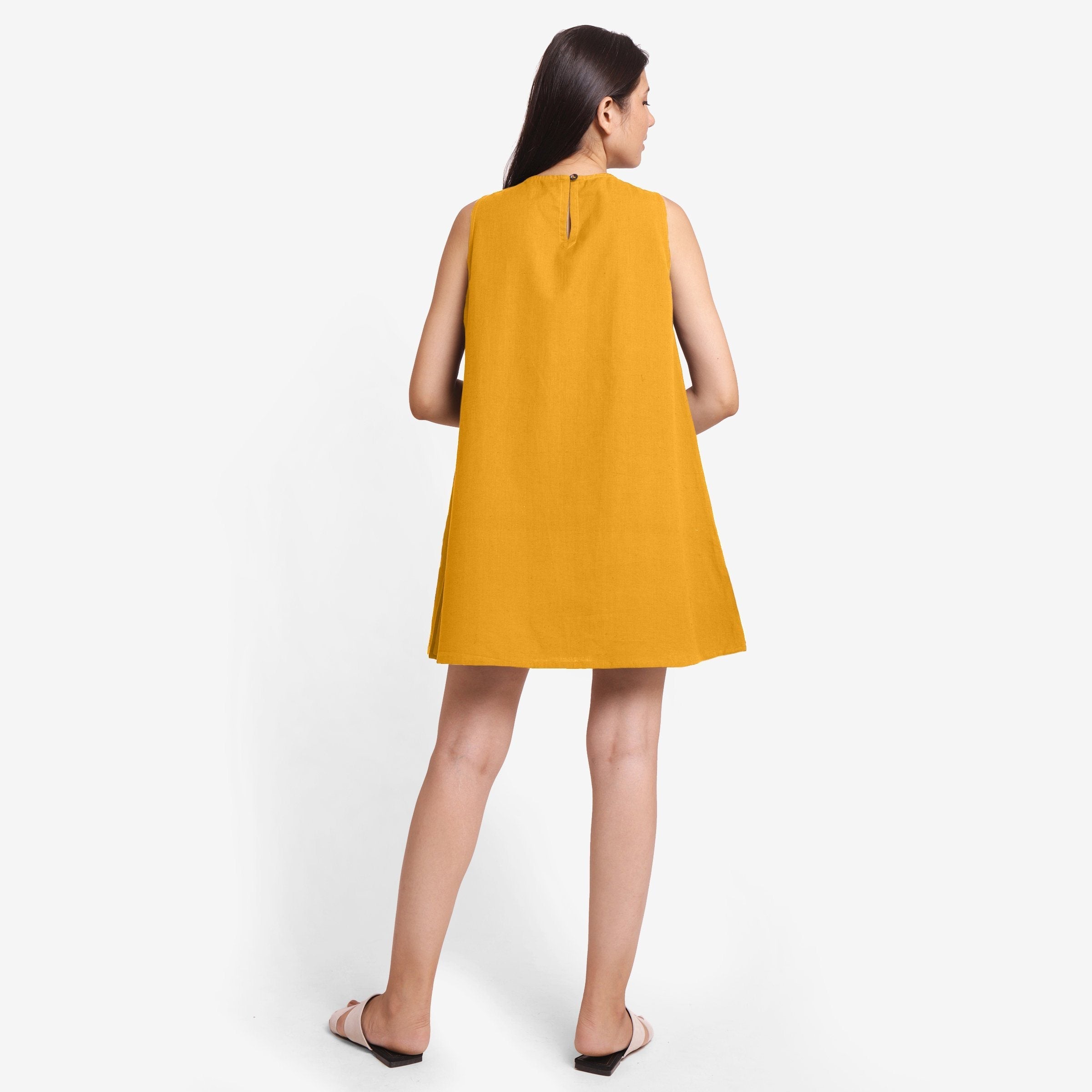 Back View of a Model wearing Yellow Cotton Flax Kangaroo Pocket Dress