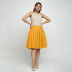 Front View of a Model wearing Yellow Cotton Flax Pleated Skirt
