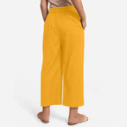 Back View of a Model wearing Yellow Cotton Flax Wide Legged Pant