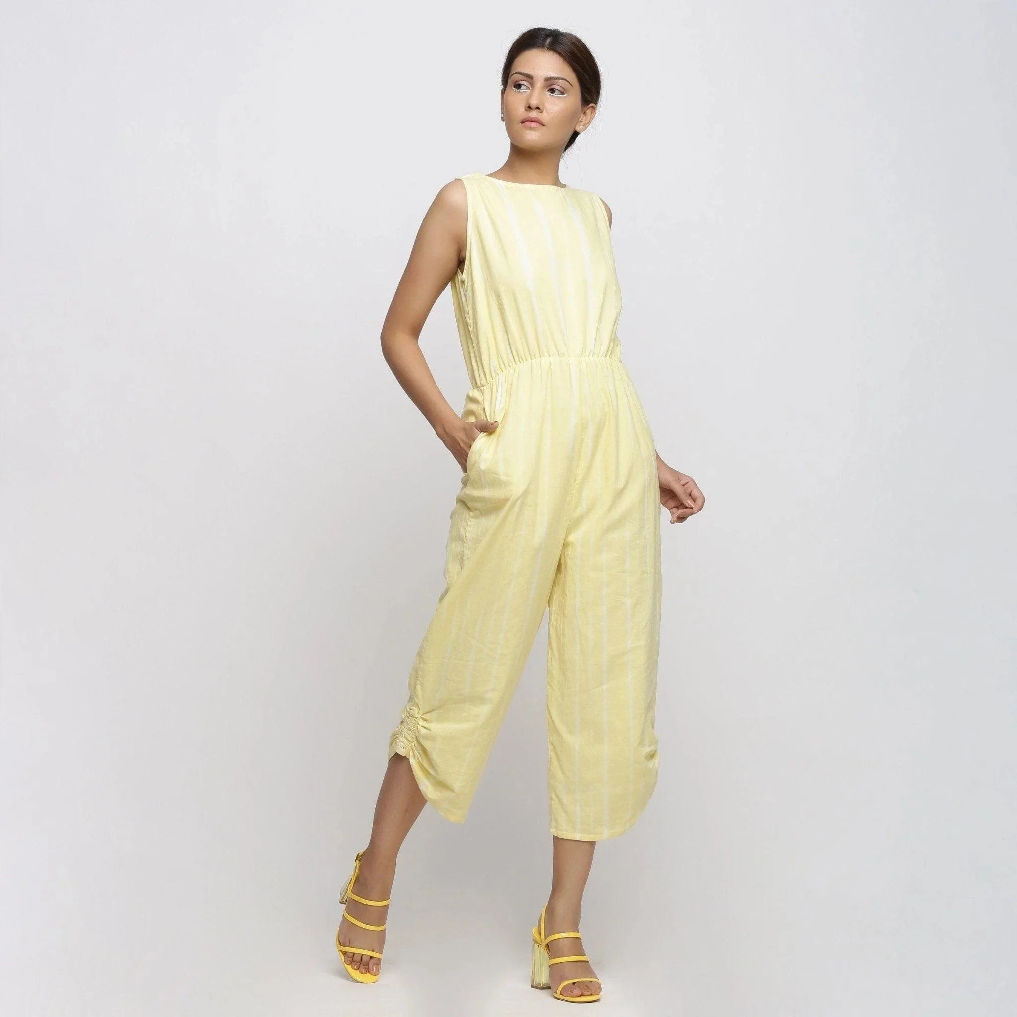 Right View of a Model wearing Yellow Hand Tie Dyed Straight Jumpsuit